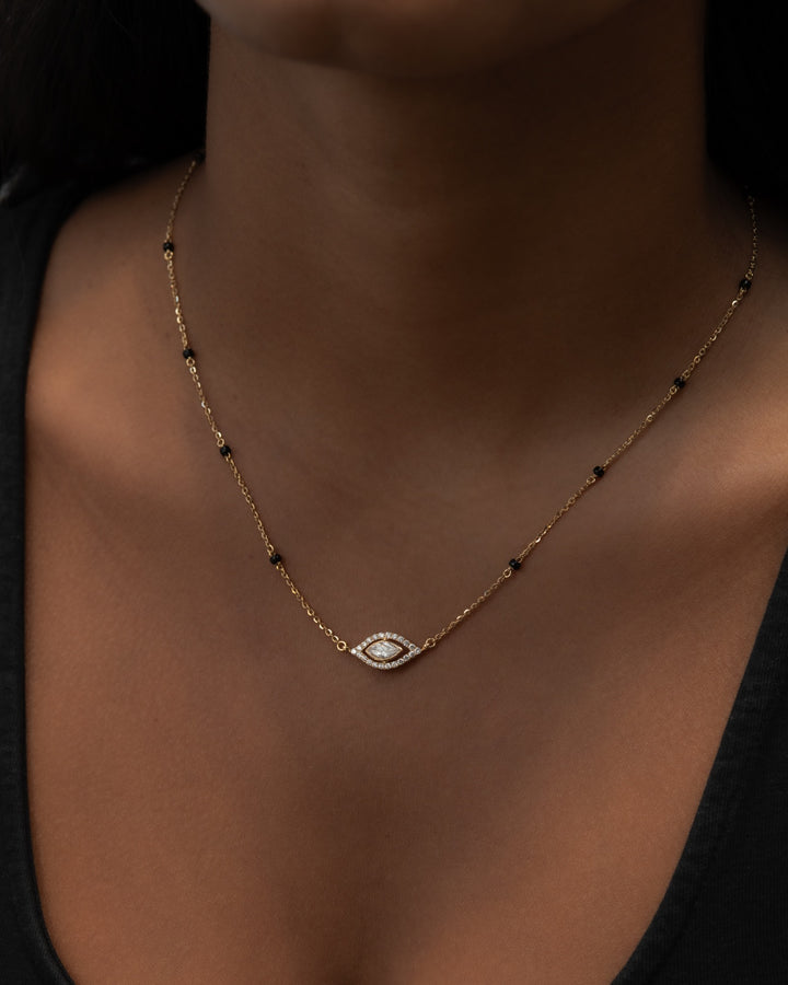 Víya Bezel Marquise and Round Diamond Evil Eye Mangalsutra Traditional Necklace 18K on body