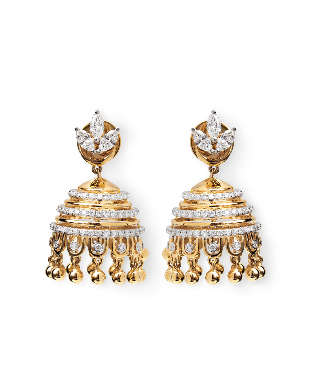 Gold and diamond earrings on a white background