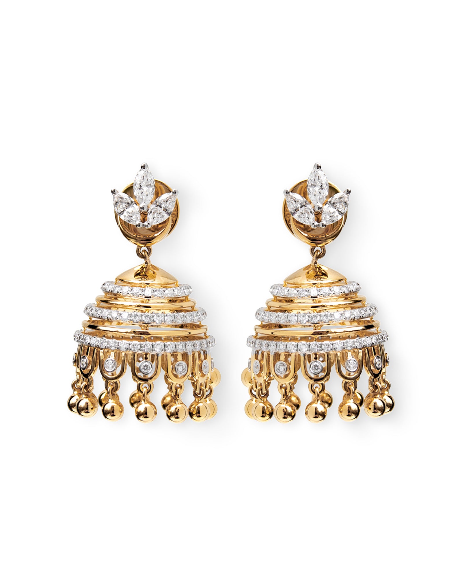 Gold and diamond earrings on a white background