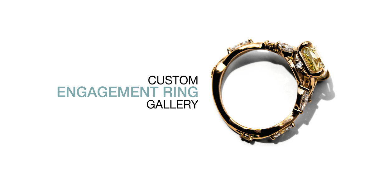 A custom engagement ring featuring a yellow gold band with a large rectangular pale yellow center stone and smaller side stones, shown on a white background with the text 'CUSTOM ENGAGEMENT RING GALLERY'.