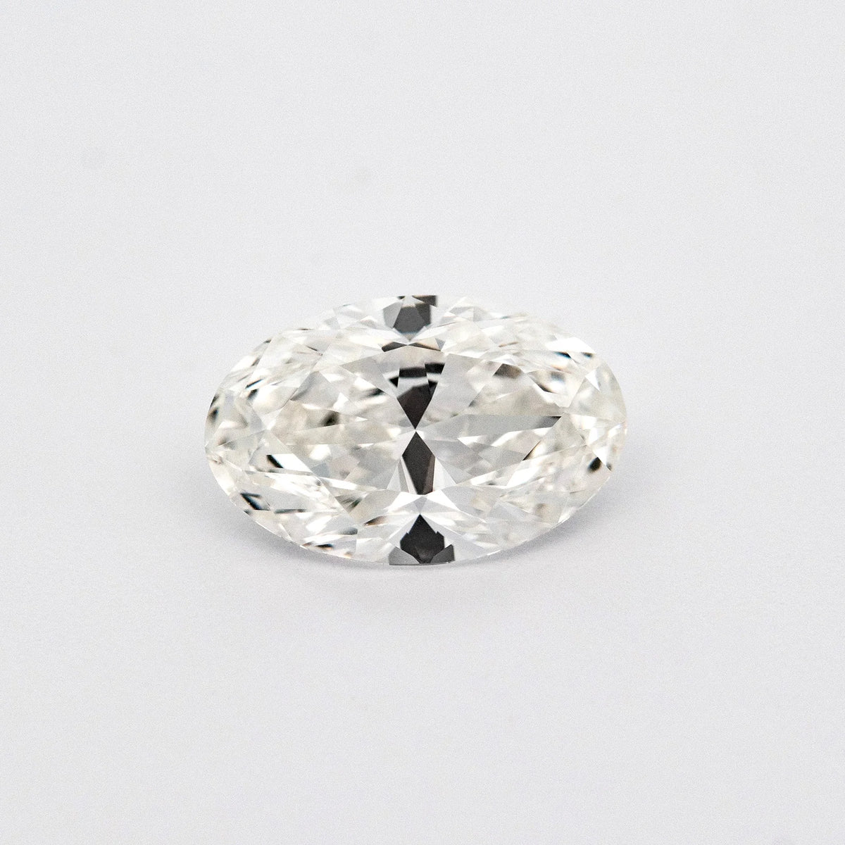 White oval on a light gray background