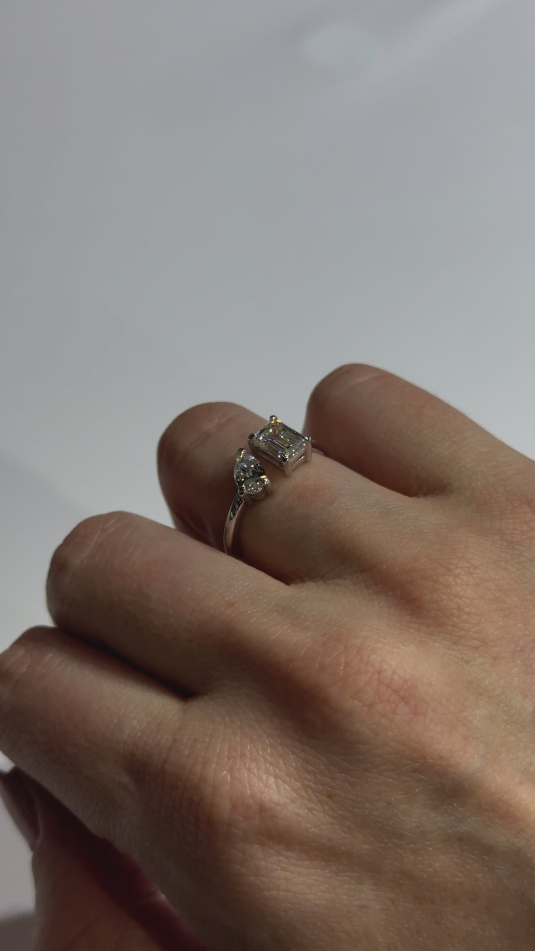 Pear and Emerald Diamond Toi et Moi  Engagement Ring on body