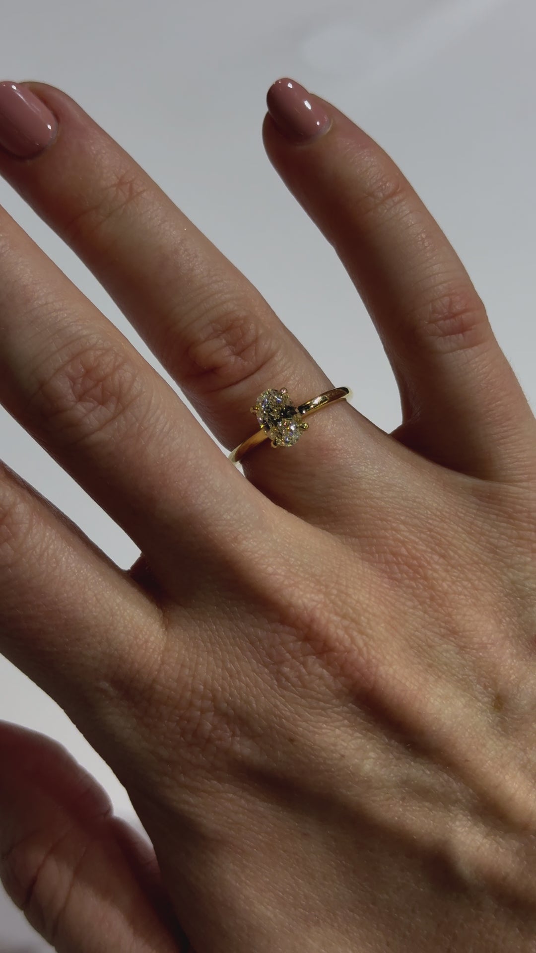 Solitaire Oval Diamond Engagement Ring on body