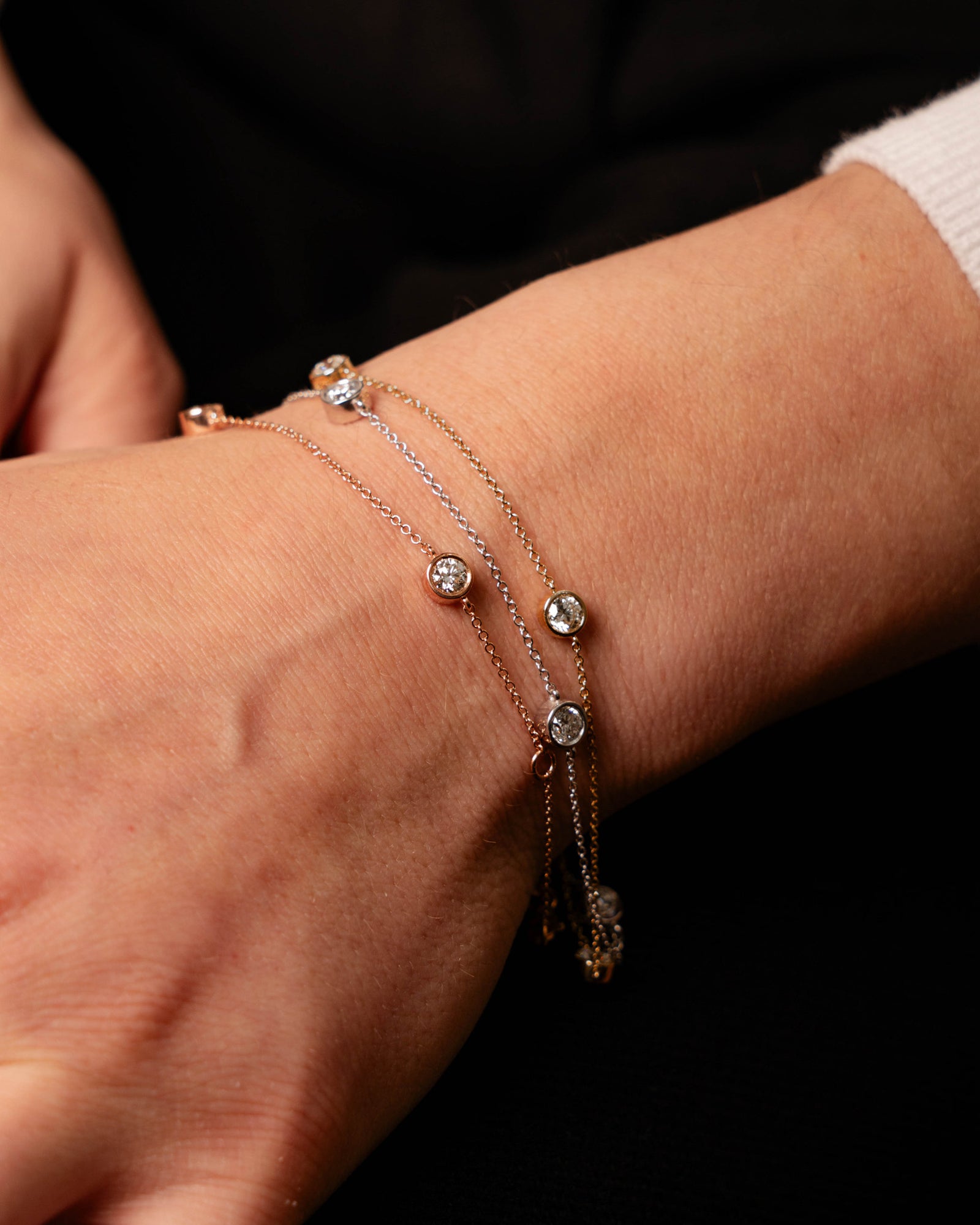 Víya Round Diamond 3-Stone Bezel Tennis Bracelet White Gold, Yellow Gold, Rose Gold 14K Stacked on body